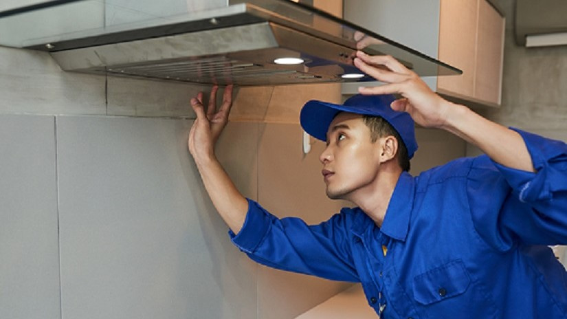 HVAC technician conducting regular heating and air conditioning maintenance
